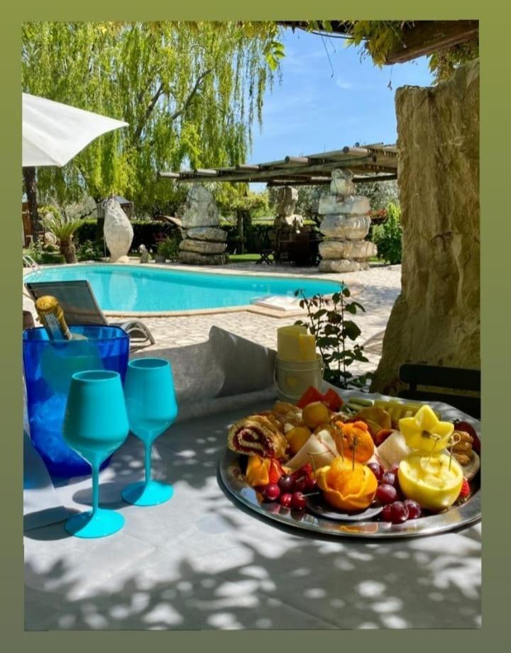 Il Giardino Dei Flintstones B&B チェルヴェーテリ エクステリア 写真