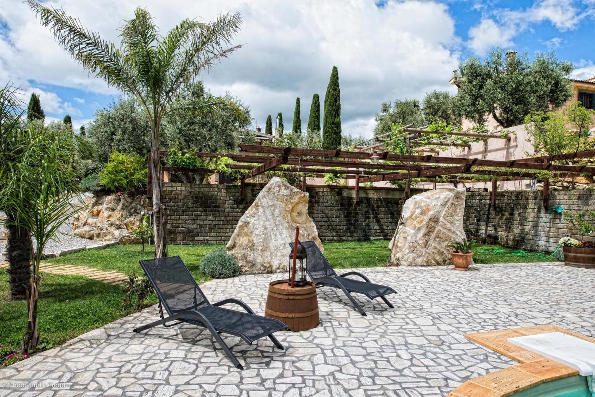 Il Giardino Dei Flintstones B&B チェルヴェーテリ エクステリア 写真